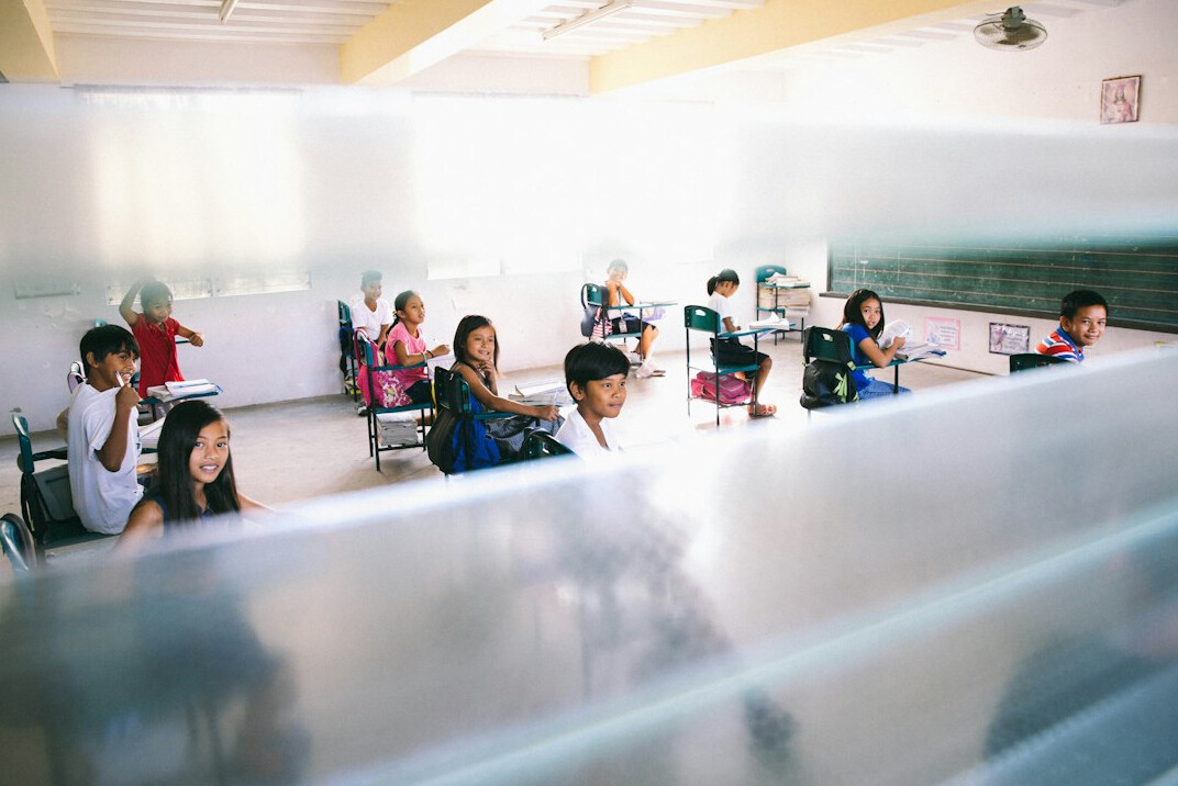 students learning coding in classroom