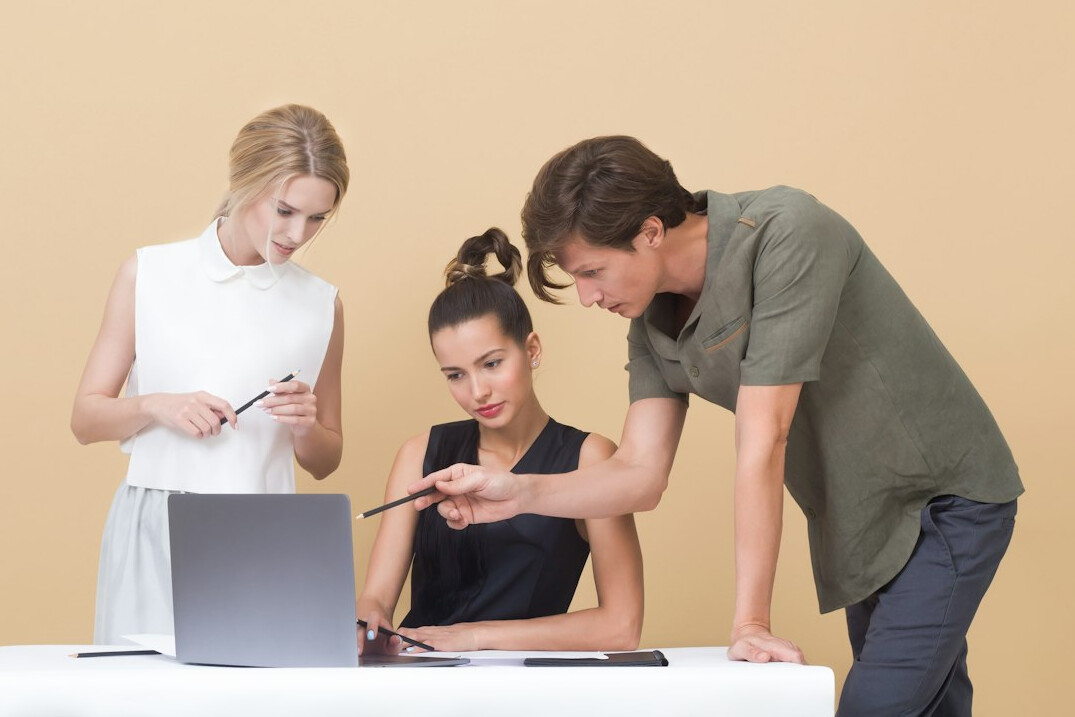 team discussing tech ideas