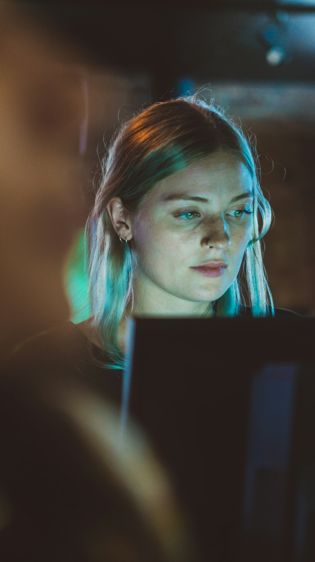 young woman learning to code