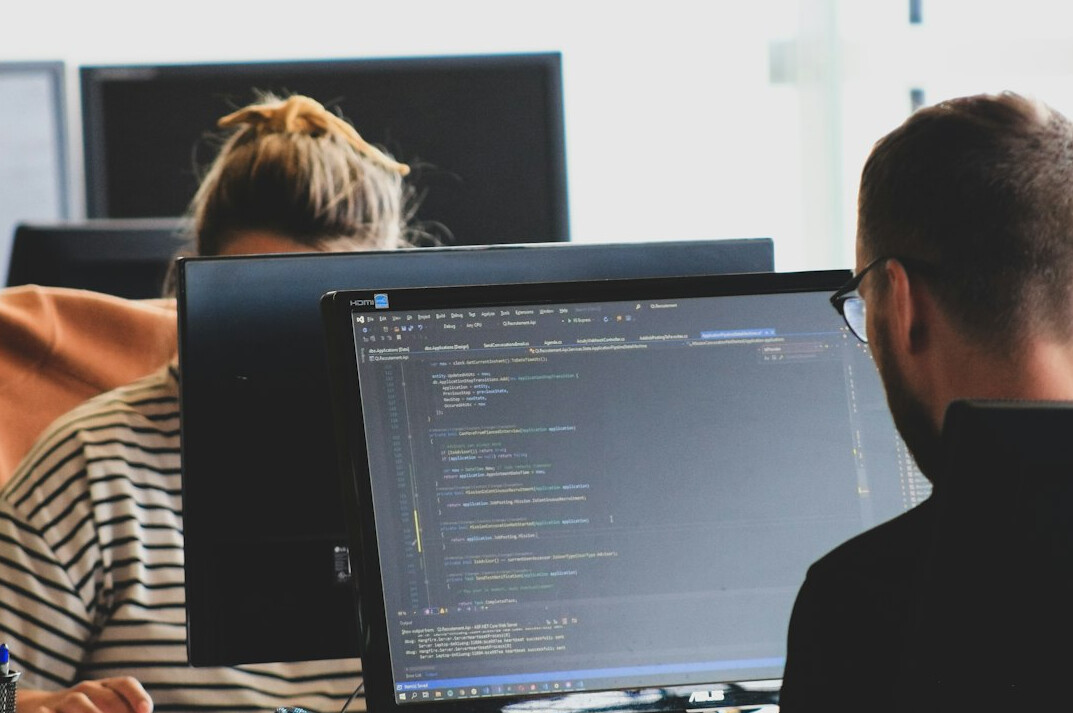 group of developers in meeting