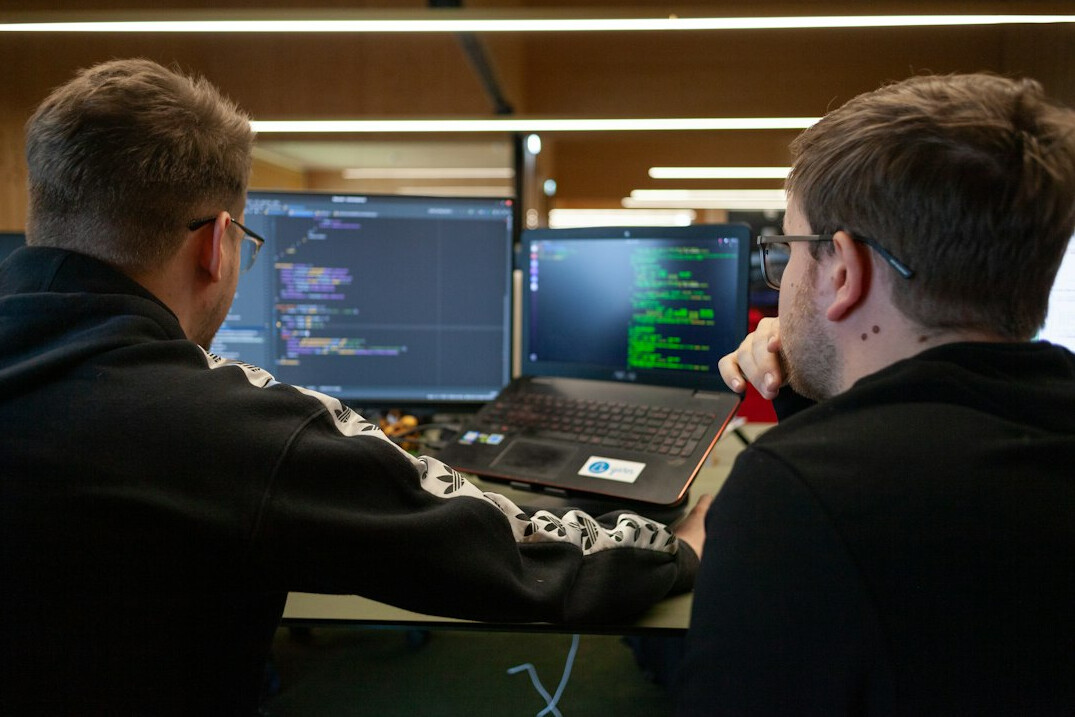group of programmers collaborating